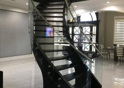 Direct Glass 12mm Frameless Inside Railing with standoffs circular staircase